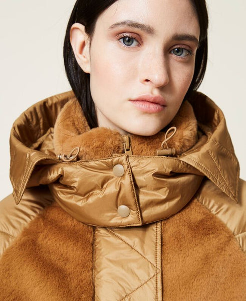 Piumino trapuntato con inserti