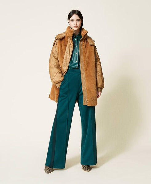 Piumino trapuntato con inserti