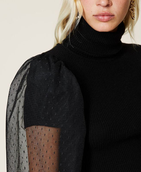 Maglia dolcevita con maniche in tulle