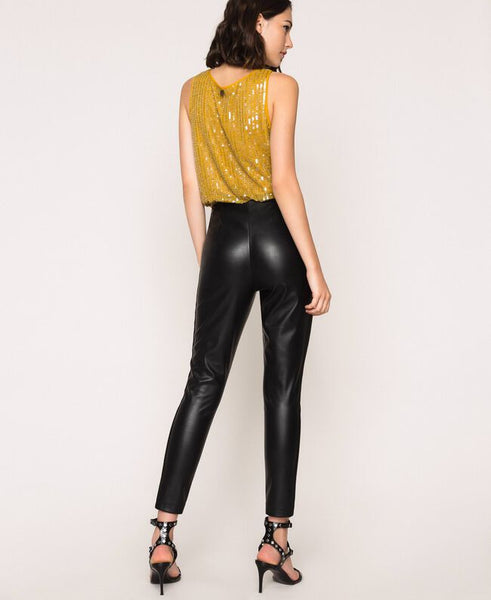 Leggings in similpelle con zip