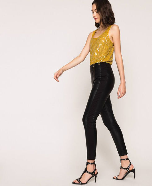 Leggings in similpelle con zip