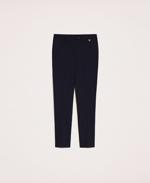 Pantaloni fitted con tasche