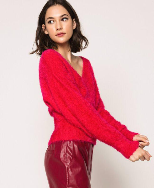 Maglia dolcevita con bottoni strass