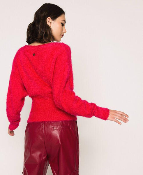 Maglia dolcevita con bottoni strass