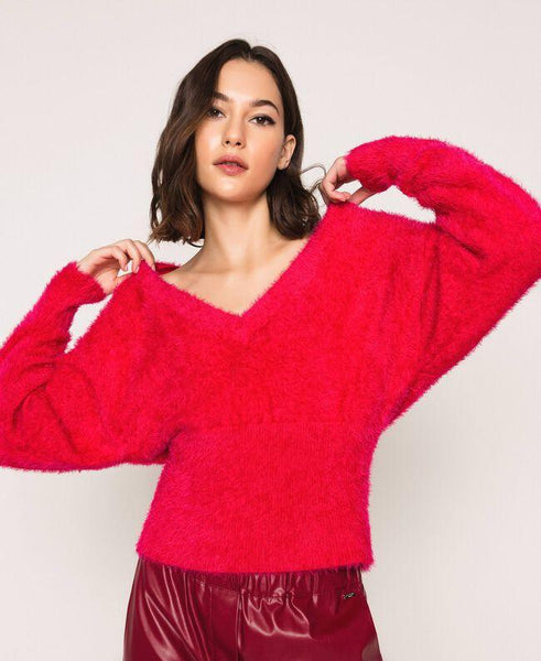 Maglia dolcevita con bottoni strass
