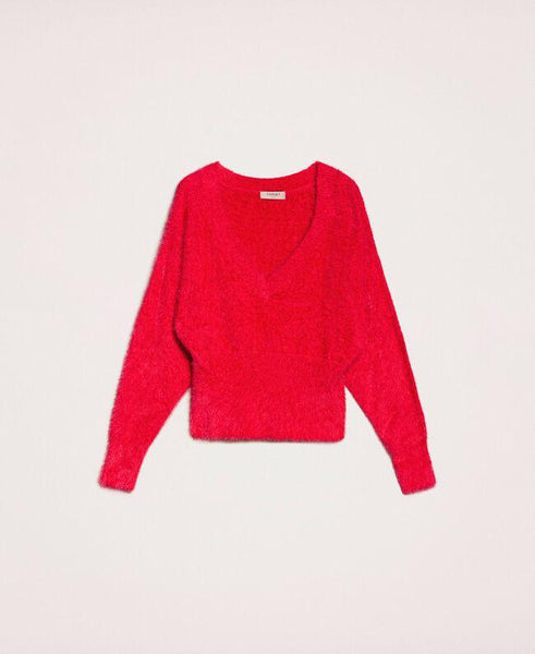 Maglia dolcevita con bottoni strass