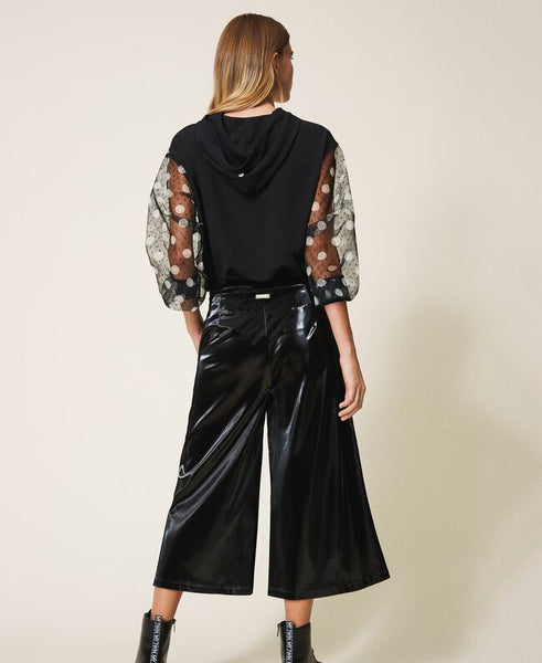 Pantaloni cropped in vernice