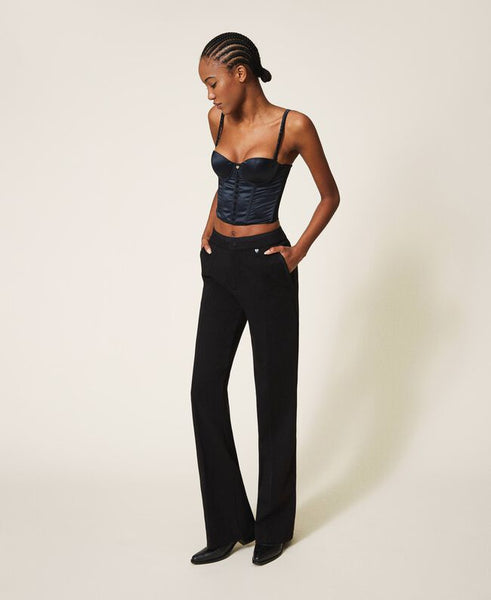Pantaloni con dettagli in crêpe de Chine