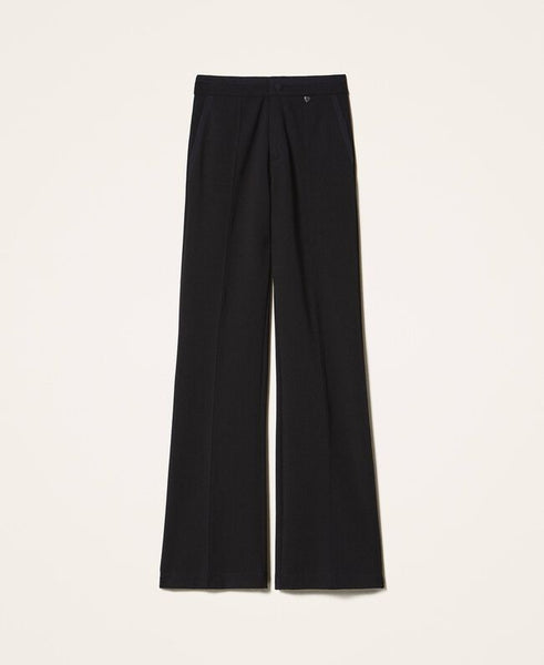 Pantaloni con dettagli in crêpe de Chine