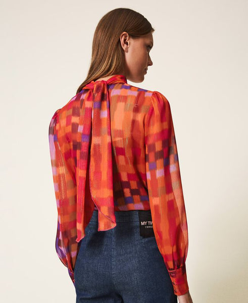 Blusa in creponne lurex stampato