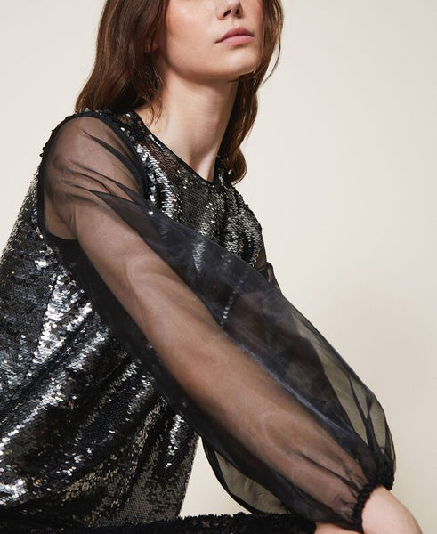 Blusa in full paillettes e organza