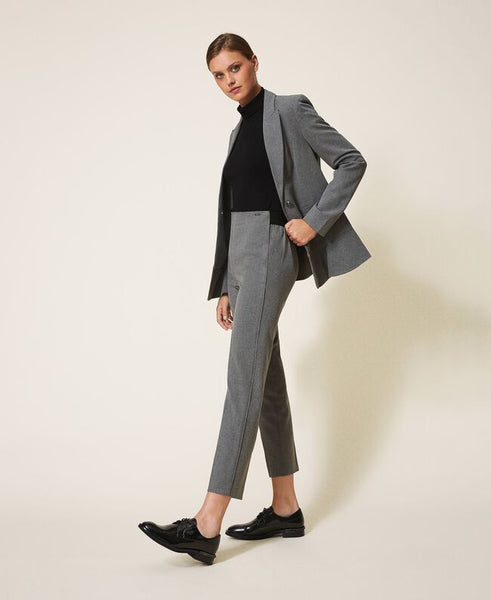 Pantaloni a sigaretta con piping