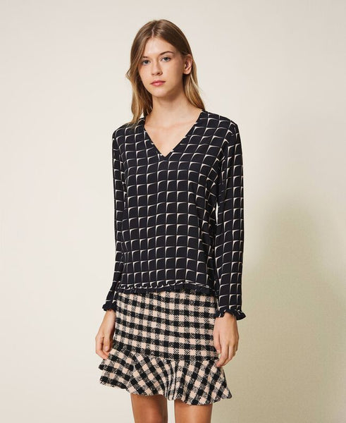 Blusa in crêpe de Chine stampata con balze