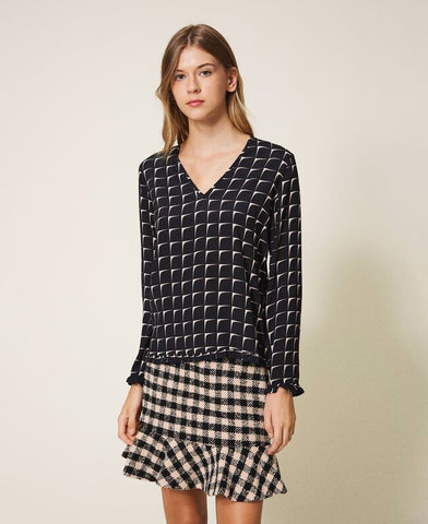 Blusa in crêpe de Chine stampata con balze
