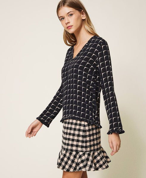 Blusa in crêpe de Chine stampata con balze