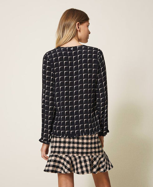 Blusa in crêpe de Chine stampata con balze