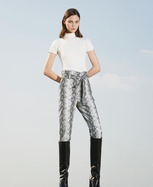Pantaloni in similpelle animalier
