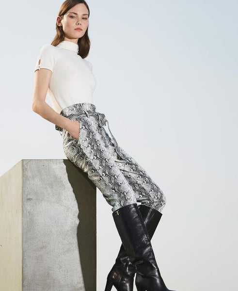 Pantaloni in similpelle animalier