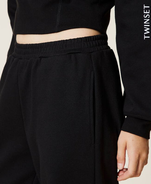 Joggers con logo