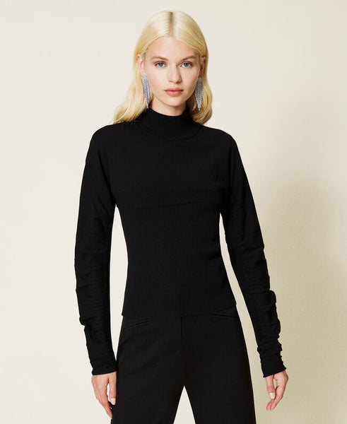 Top a costine e maglia cropped