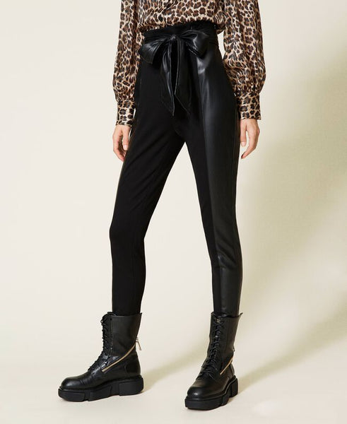 Pantaloni skinny a vita alta