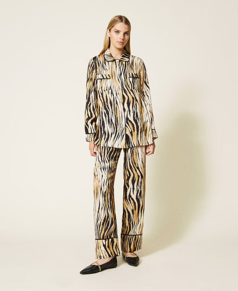 Pantaloni in raso a stampa animalier