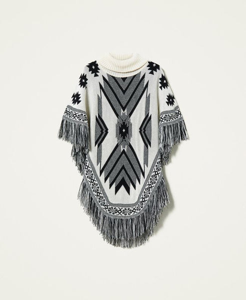 Poncho jacquard con frange