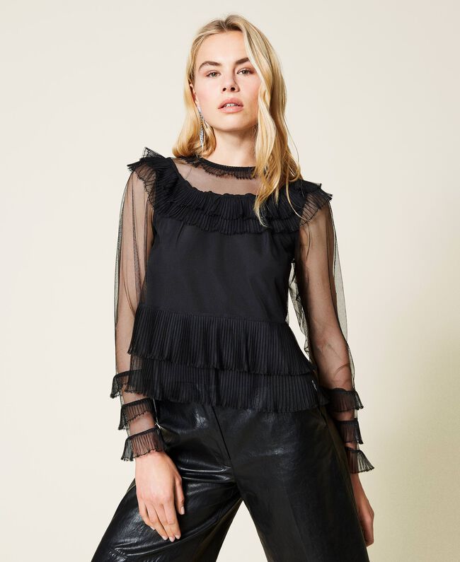 Blusa in tulle con balze plissé