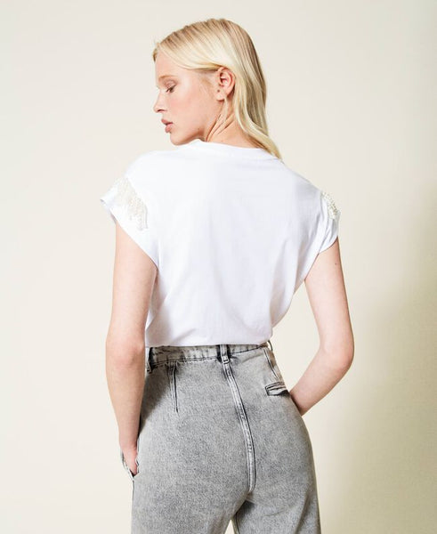 T-shirt con frange di perle